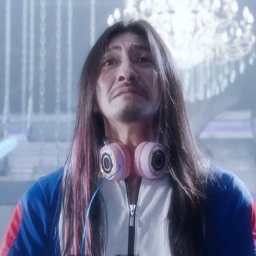 ヘッドフォンを付けている宮島三郎の画像
